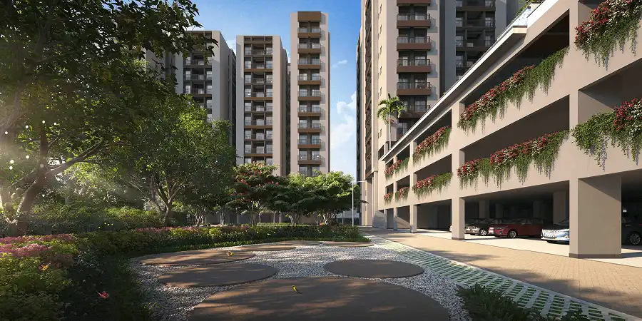 Srijan Spacia podium garden and landscaped driveway with flowering plants