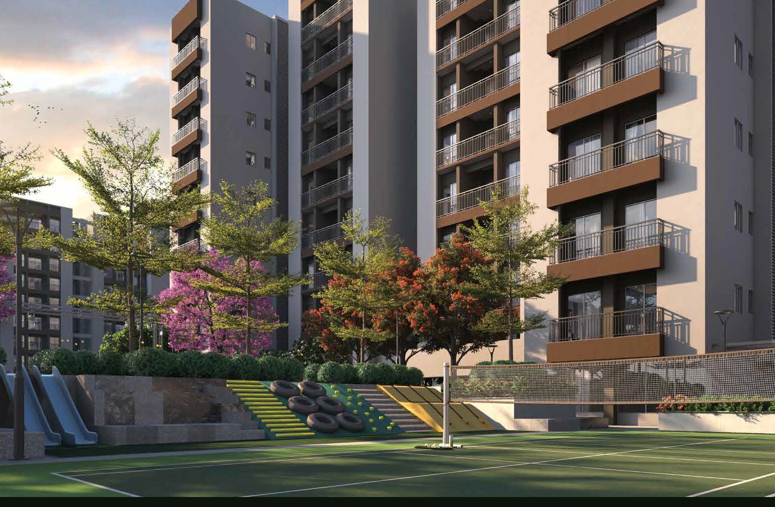 Srijan Spacia sports courts – tennis, kids slides and play area with lush trees